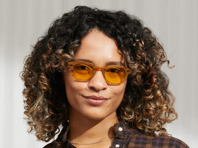 Model is wearing The LEMTOSH in Blonde in size 46 with Mellow Yellow Tinted Lenses