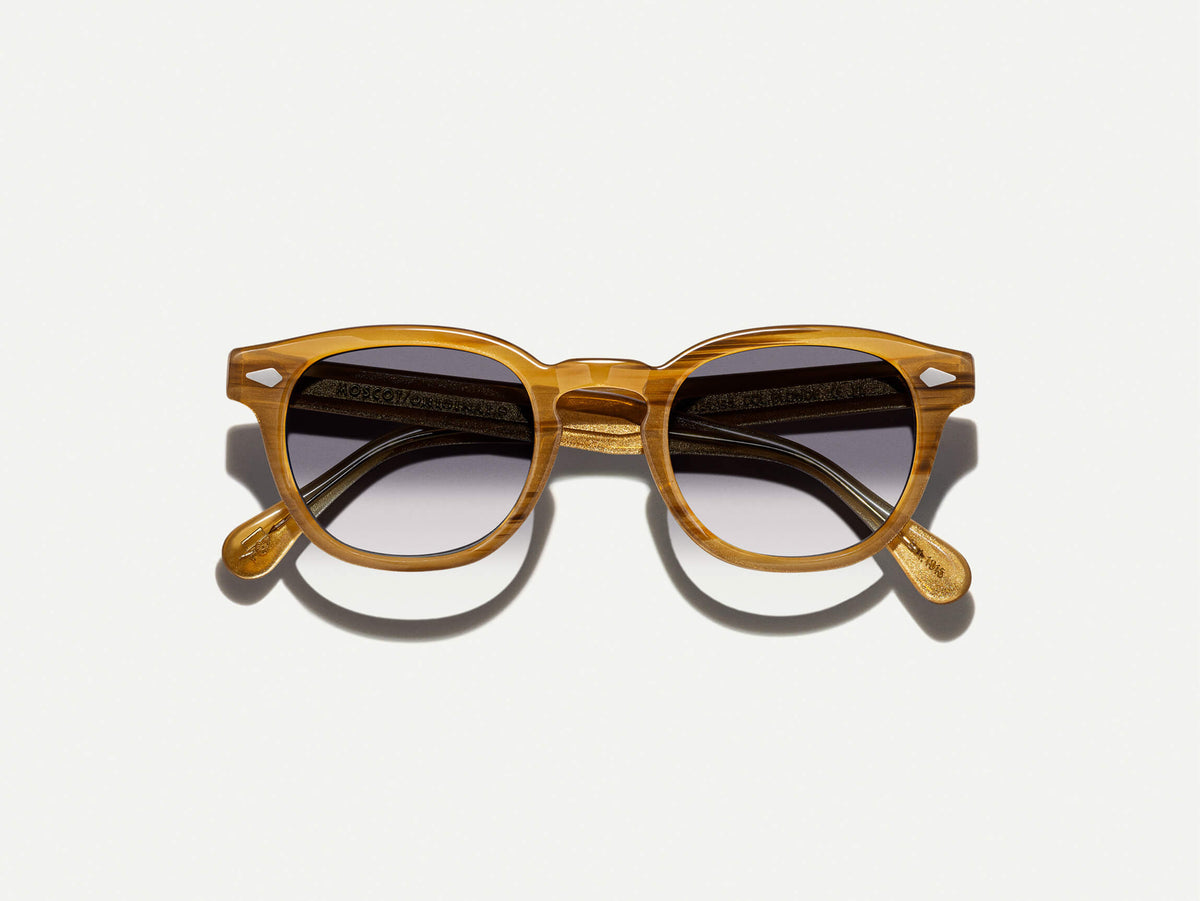O LEMTOSH Blonde com lentes tintadas American Grey Fade