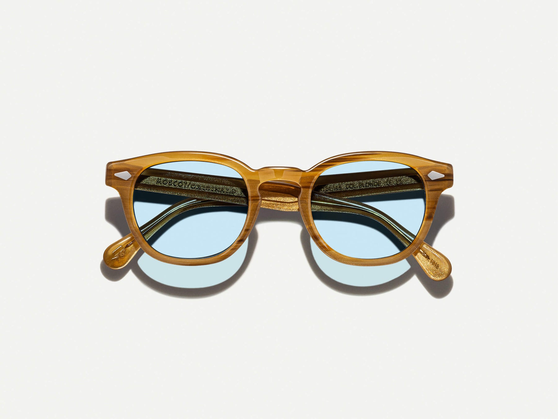 The LEMTOSH Blonde with Bel Air Blue Tinted Lenses