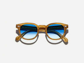 The LEMTOSH Blonde with Broadway Blue Fade Tinted Lenses