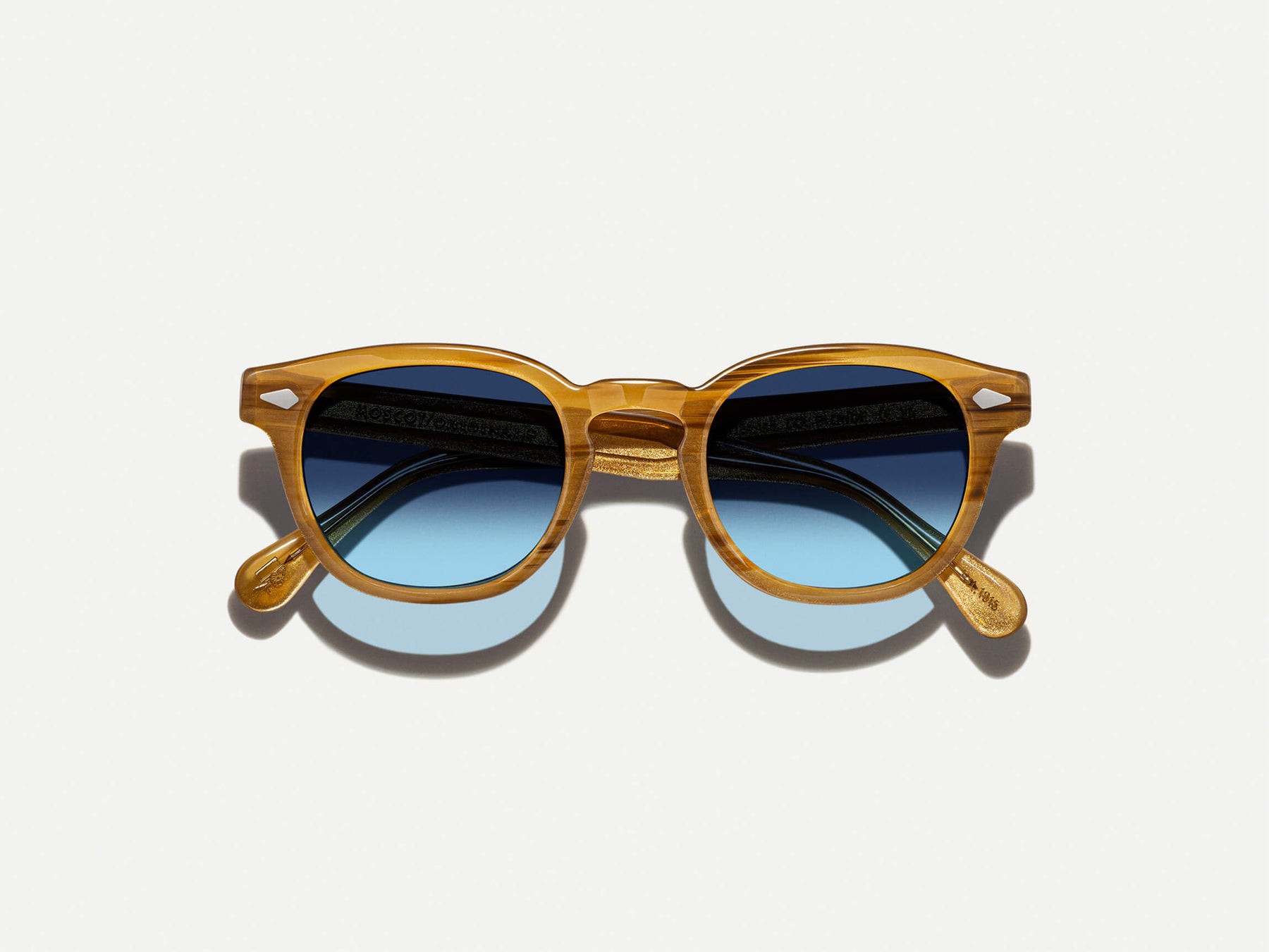 The LEMTOSH Blonde with Denim Blue Tinted Lenses