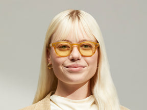 Model is wearing The LEMTOSH in Blonde in size 46 with Pastel Yellow Tinted Lenses