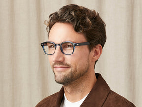 Model is wearing The LEMTOSH 110 in size 49 in 110 Blue