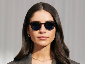 Model is wearing The LEMTOSH in Tortoise in size 46 with BLUE⁺ Tinted Lenses