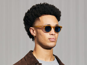 Model is wearing The LEMTOSH in Blonde in size 46 with BLUE⁺ Tinted Lenses