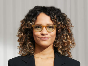 Model is wearing The LEMTOSH in Blonde size 46 with GREEN+ Tinted Lenses