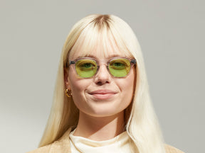 Model is wearing The LEMTOSH in Light Grey in size 46 with Garnet Green Tinted Lenses