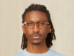 Model is wearing The LEMTOSH w/ Metal Nose Pads in size 46 in Brown Ash