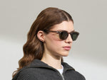 Model is wearing The LEMTOSH SUN-POLARIZED in size 49 in Brown Ash with G-15 Glass Polarized Lenses
