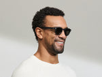 Model is wearing The LEMTOSH SUN-POLARIZED in size 46 in Matte Black with Grey Glass Polarized Lenses