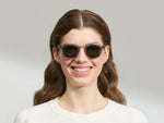 Model is wearing The LEMTOSH SUN in size 49 in Light Grey with G-15 Glass Lenses