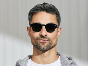 Model is wearing The LEMTOSH SPORT in Black in size 46 with G-15 Polarized Nylon Lenses