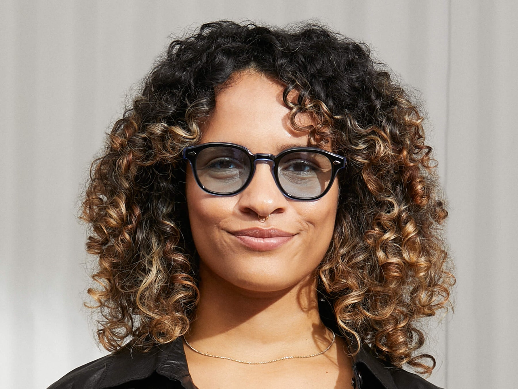 Model is wearing The LEMTOSH 110 in 110 Blue in size 49 with Bel Air Blue Tinted Lenses