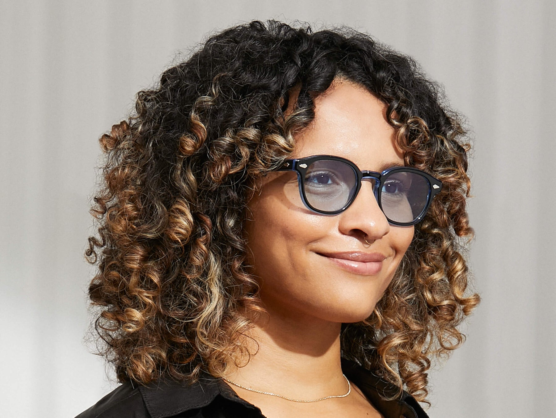 Model is wearing The LEMTOSH 110 in 110 Blue in size 49 with Bel Air Blue Tinted Lenses