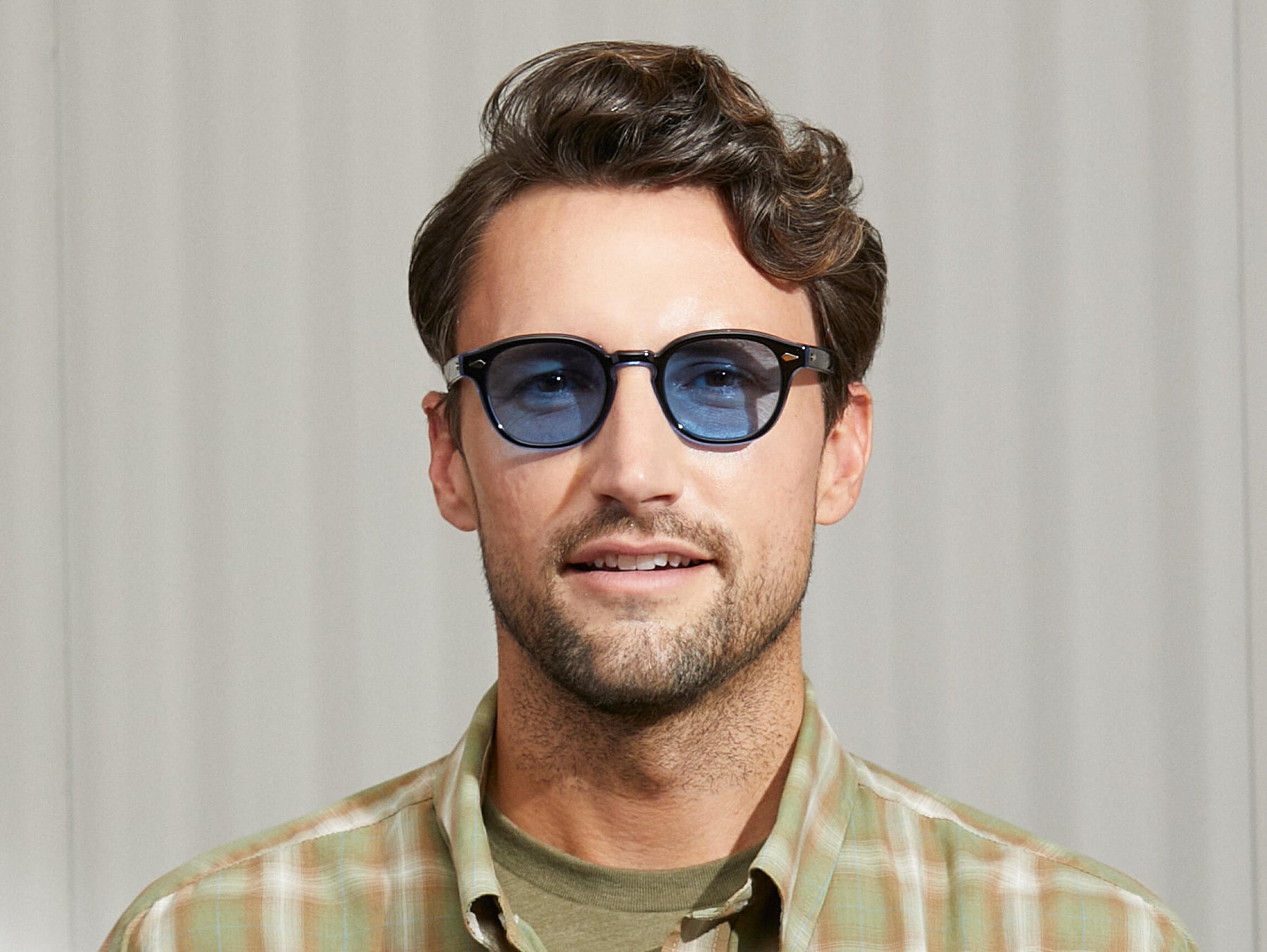 Model is wearing The LEMTOSH 110 in 110 Blue in size 49 with Celebrity Blue Tinted Lenses