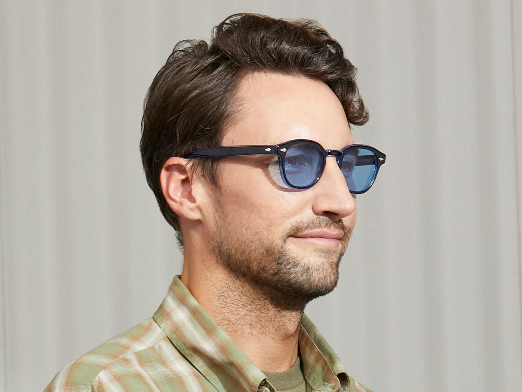 Model is wearing The LEMTOSH 110 in 110 Blue in size 49 with Celebrity Blue Tinted Lenses