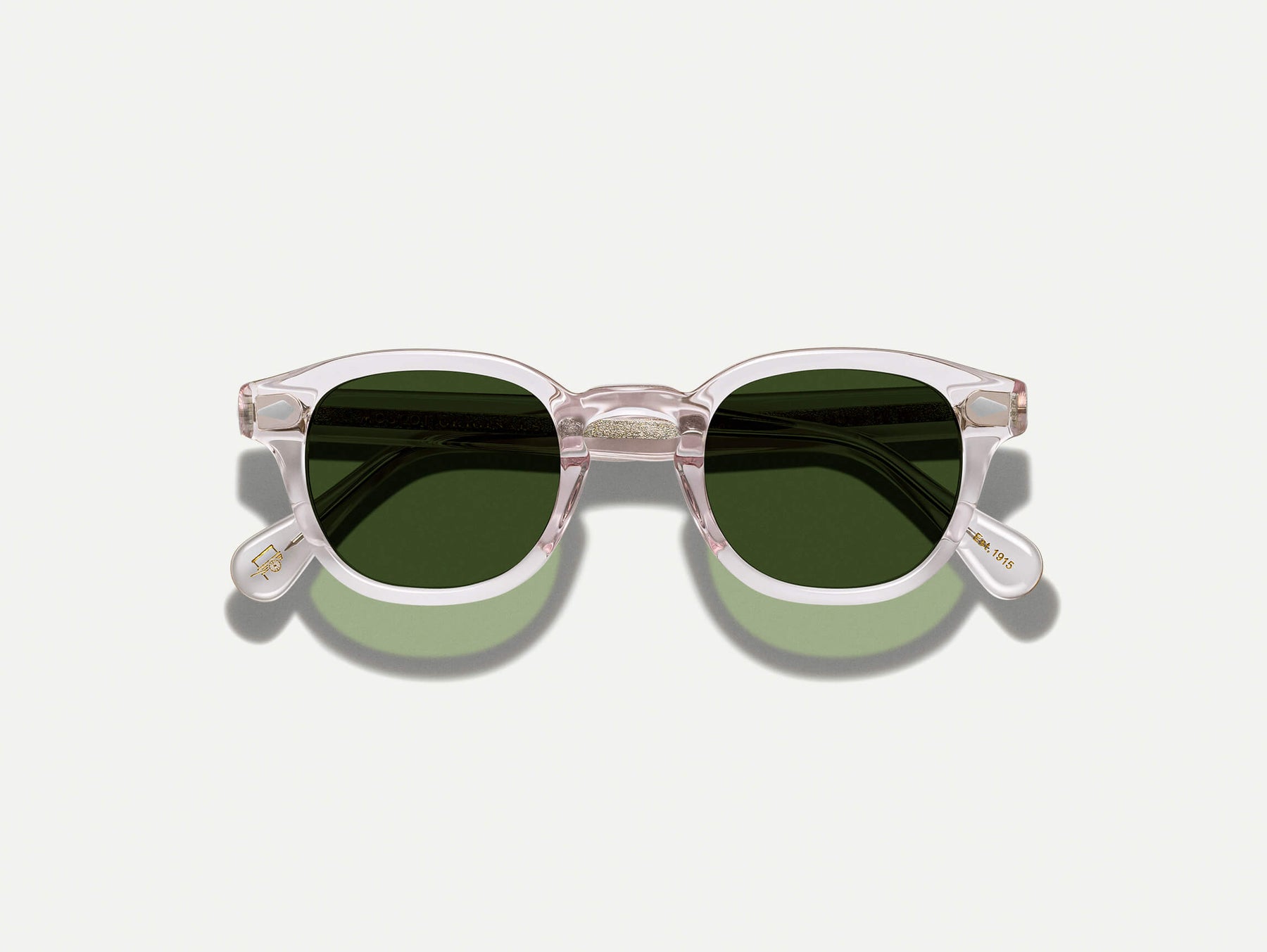 The LEMTOSH SUN in Blush with Calibar Green Glass Lenses