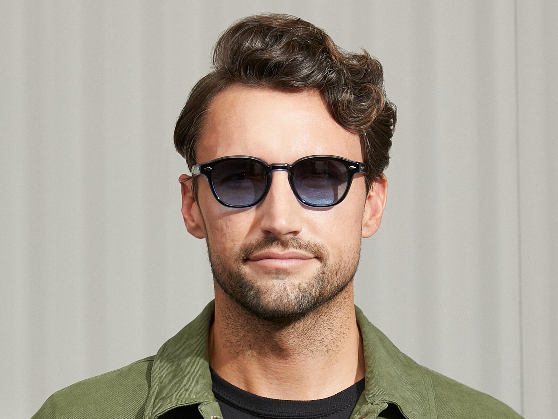 Model is wearing The LEMTOSH 110 in 110 Blue in size 49 with Denim Blue Tinted Lenses