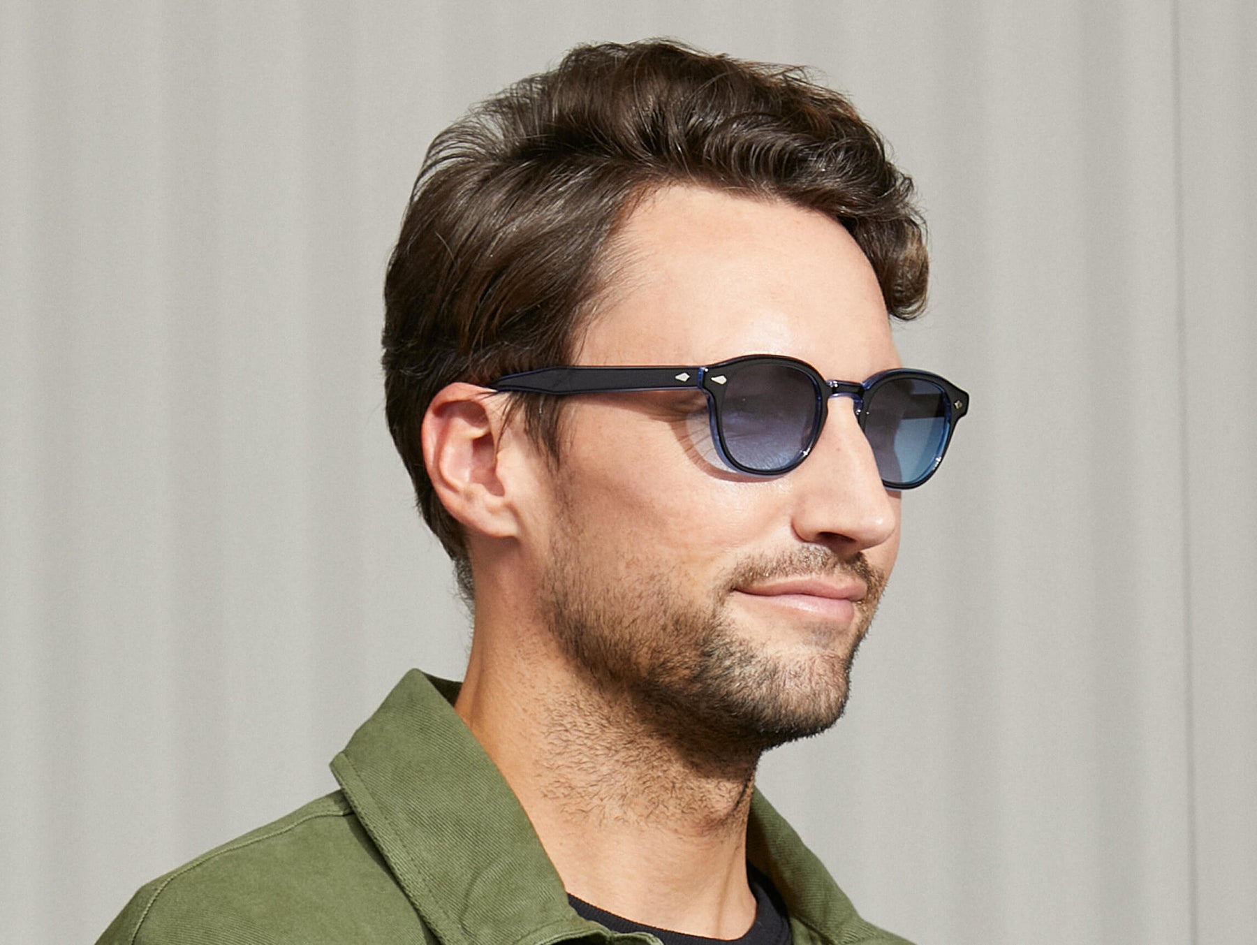 Model is wearing The LEMTOSH 110 in 110 Blue in size 49 with Denim Blue Tinted Lenses