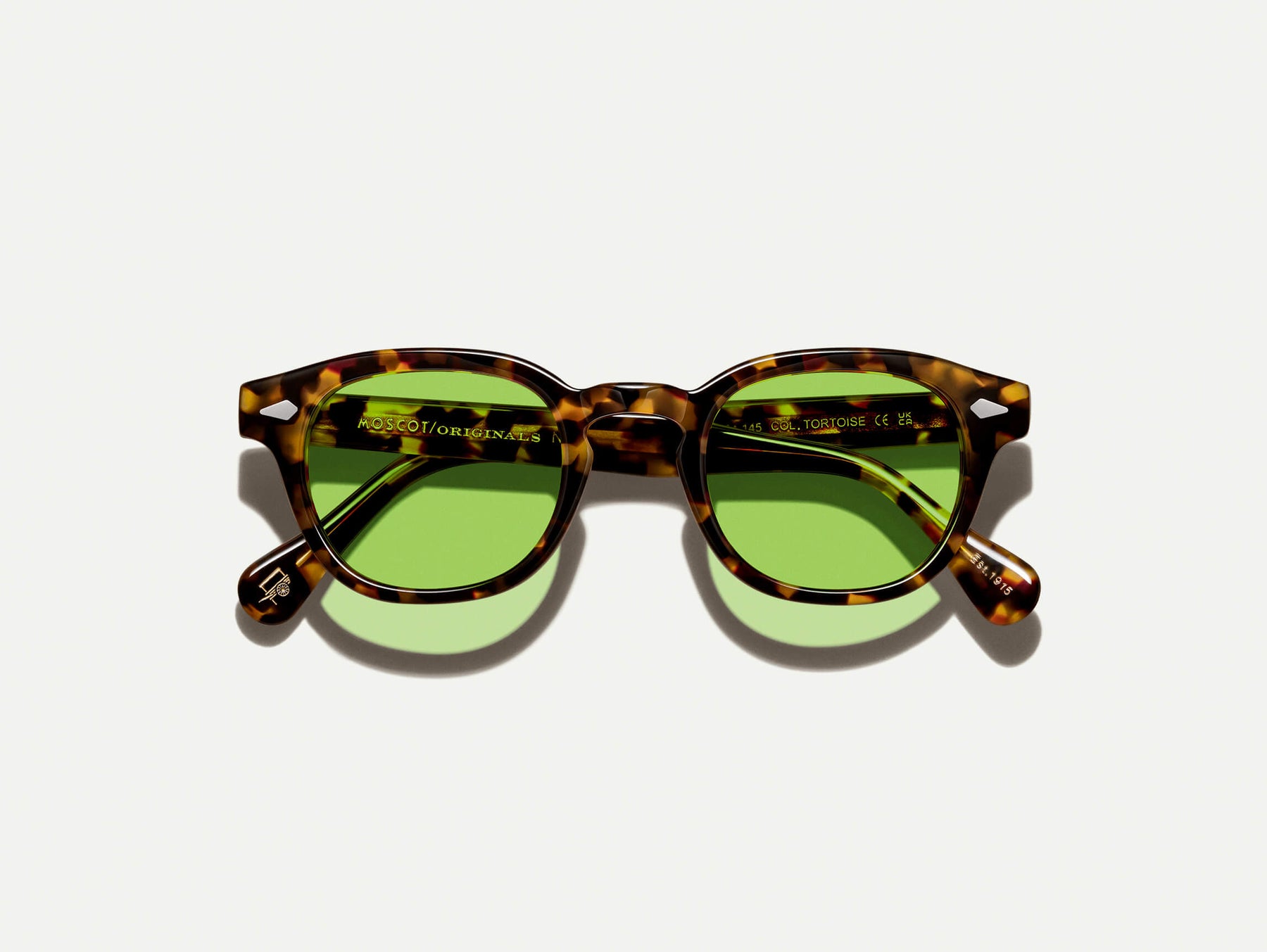 The LEMTOSH Tortoise with Garnet Green Tinted Lenses