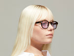 Model is wearing The LEMTOSH in Tortoise in size 46 with Lavender Tinted Lenses