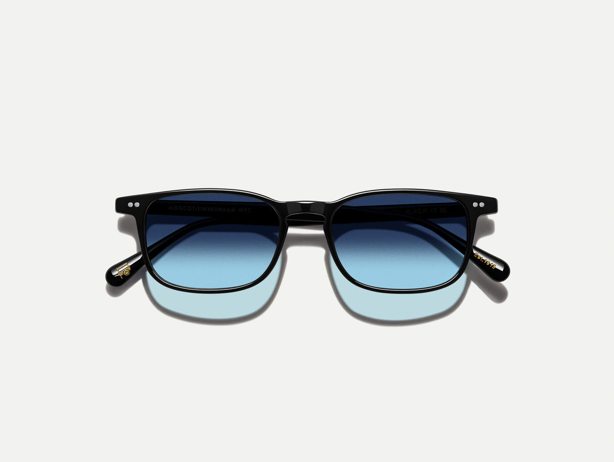 #color_black | The LIKTIG SUN in Black with Denim Blue Tinted Lenses
