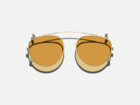 The MAYDELA CLIP in Gold with Amber Tinted Lenses