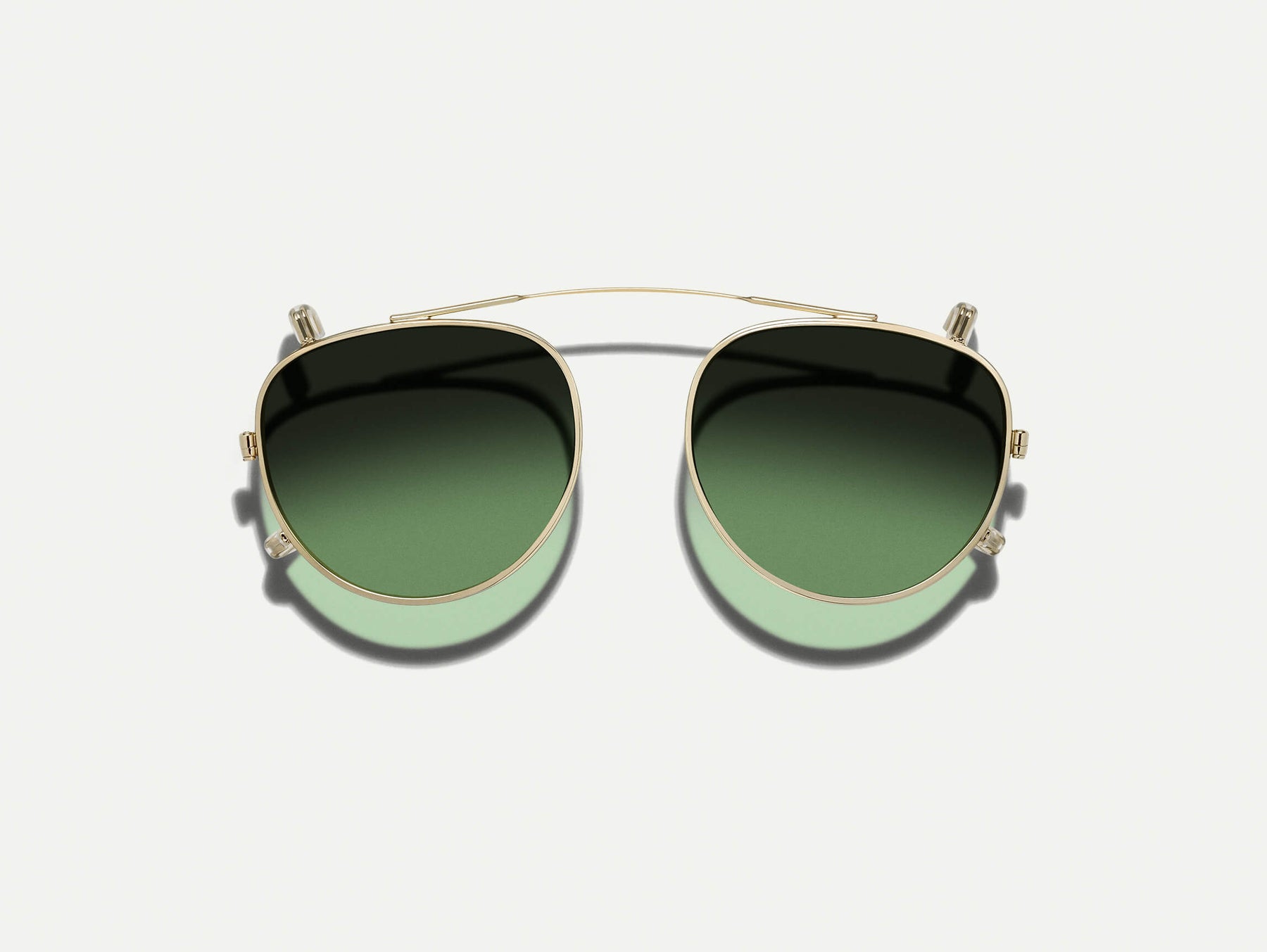 The MAYDELA CLIP in Gold with Forest Wood Tinted Lenses