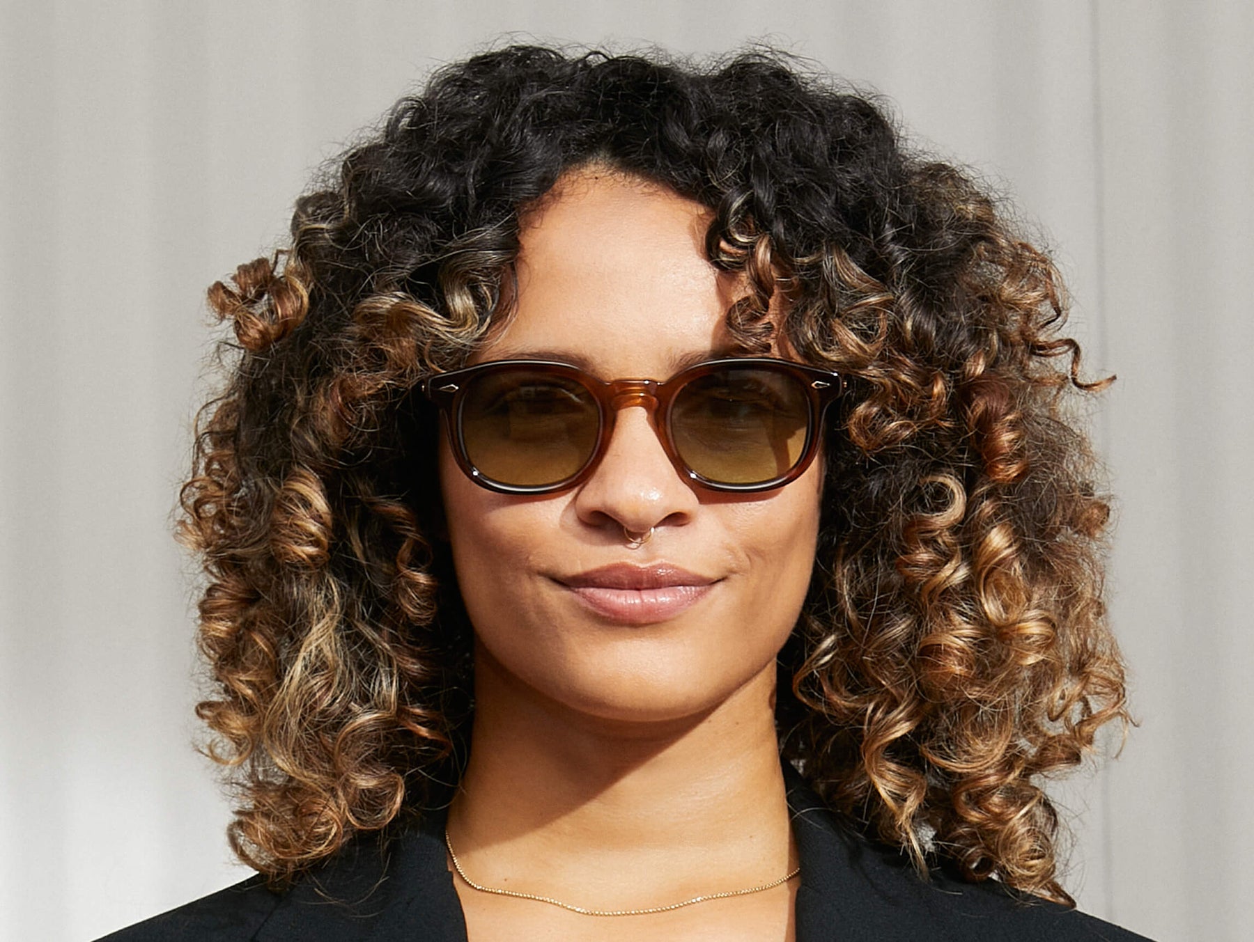 Model is wearing The MEKLER SUN in Tobacco in size 49 with Forest Wood Tinted Lenses