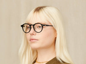 Model is wearing The MILTZEN W/ METAL NOSE PADS in size 46 in Black