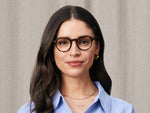Model is wearing The MILTZEN in size 46 in Tortoise