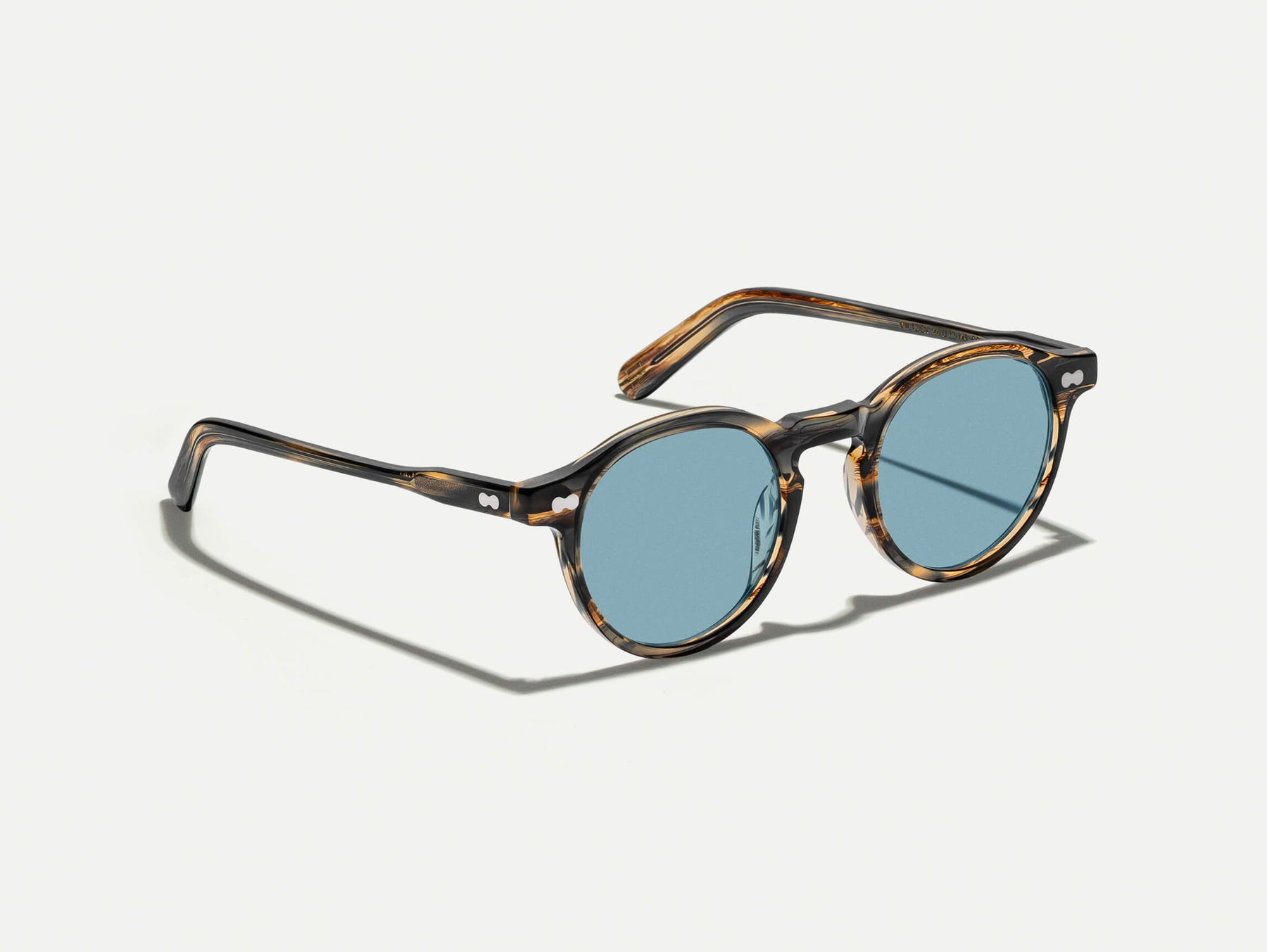 The MILTZEN in Bark with Mineral Blue Tinted Lenses