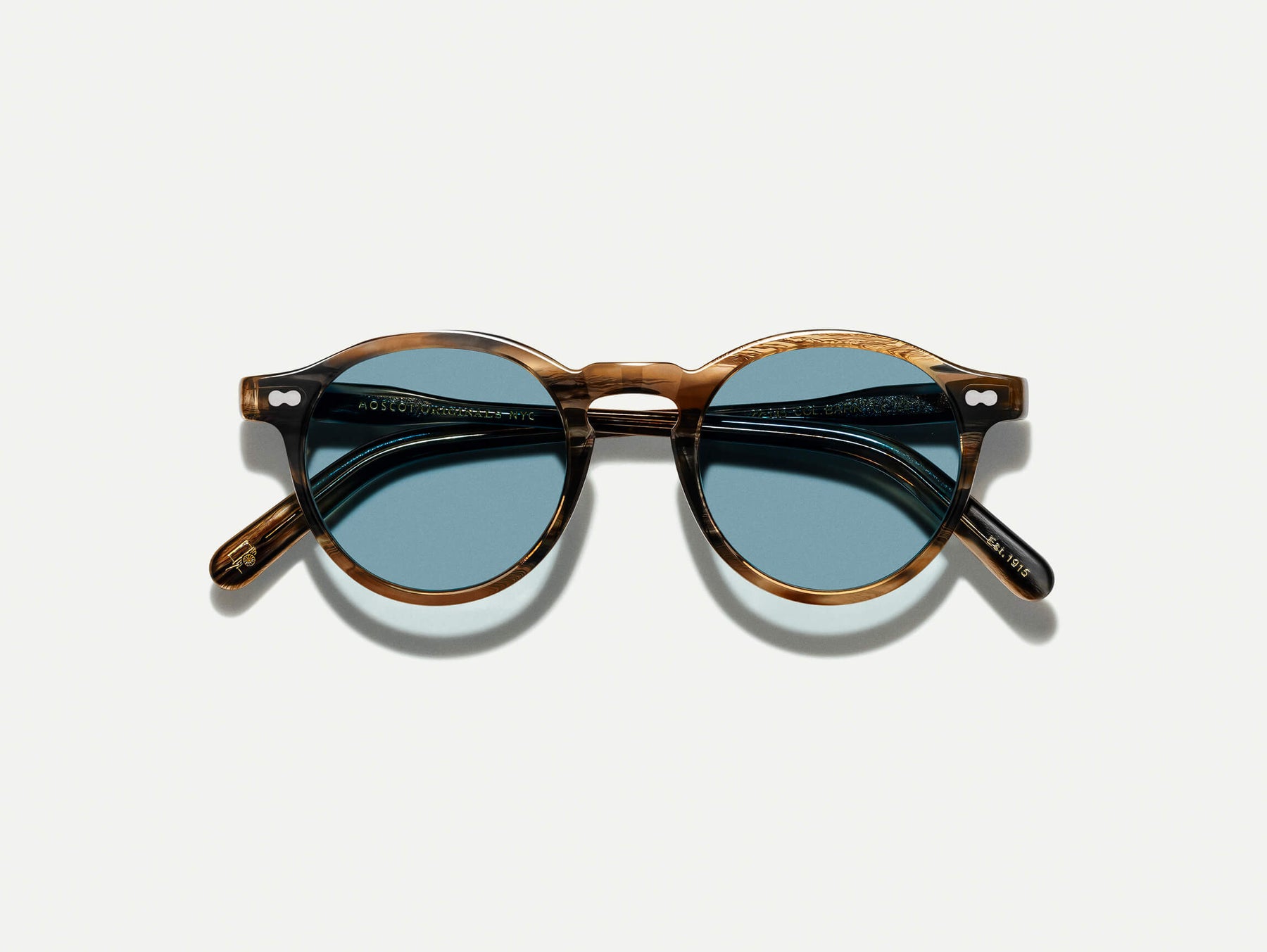 The MILTZEN in Bark with Mineral Blue Tinted Lenses