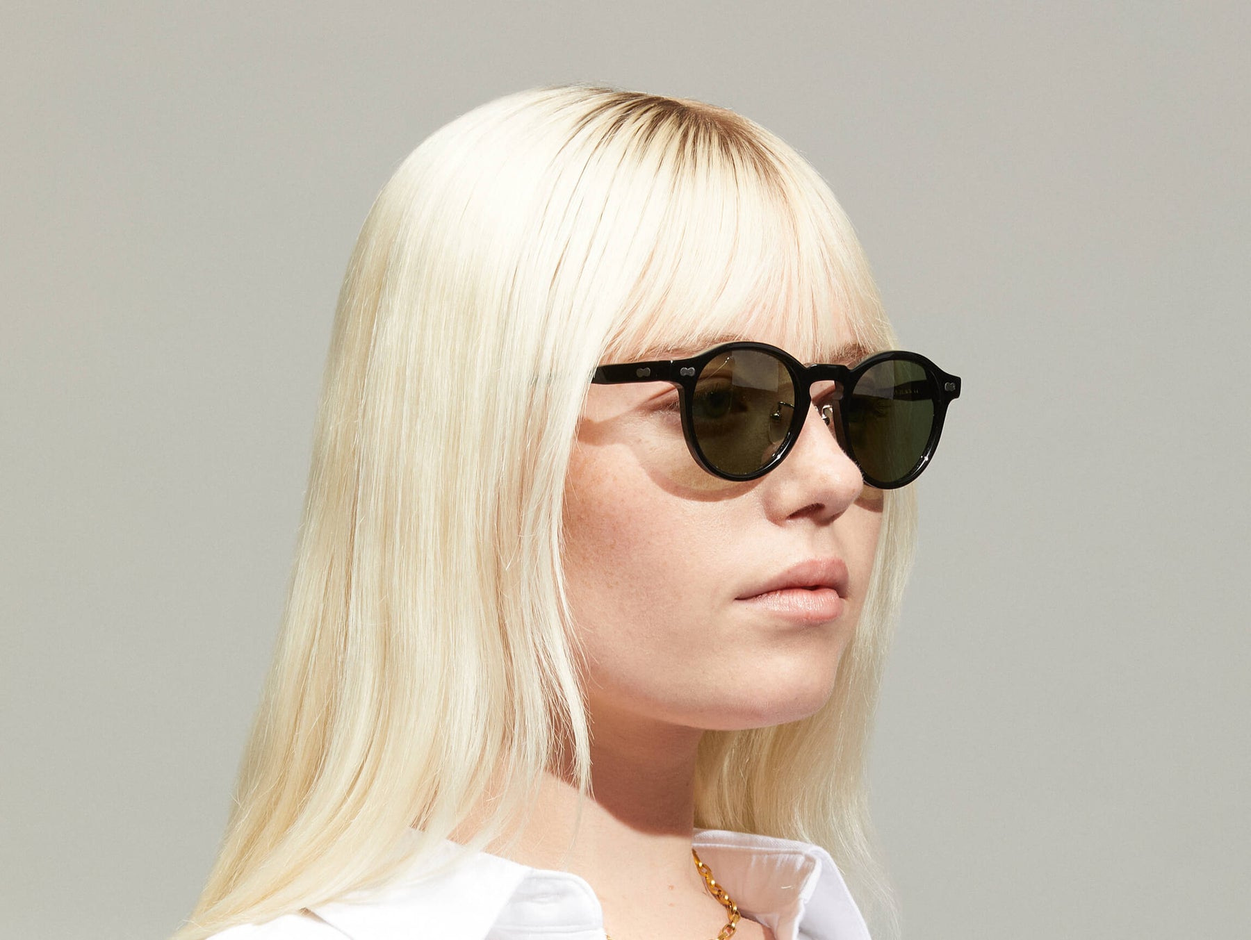 Model is wearing The MILTZEN SUN W/ METAL NOSE PADS in Black in size 46 with G-15 Glass Lenses