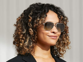 Model is wearing The MINGLE SUN in Silver in size 57 with Forest Wood Tinted Lenses