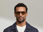 Model is wearing The MINYAN SUN in size 54 in Tortoise with Amber Tinted Lenses
