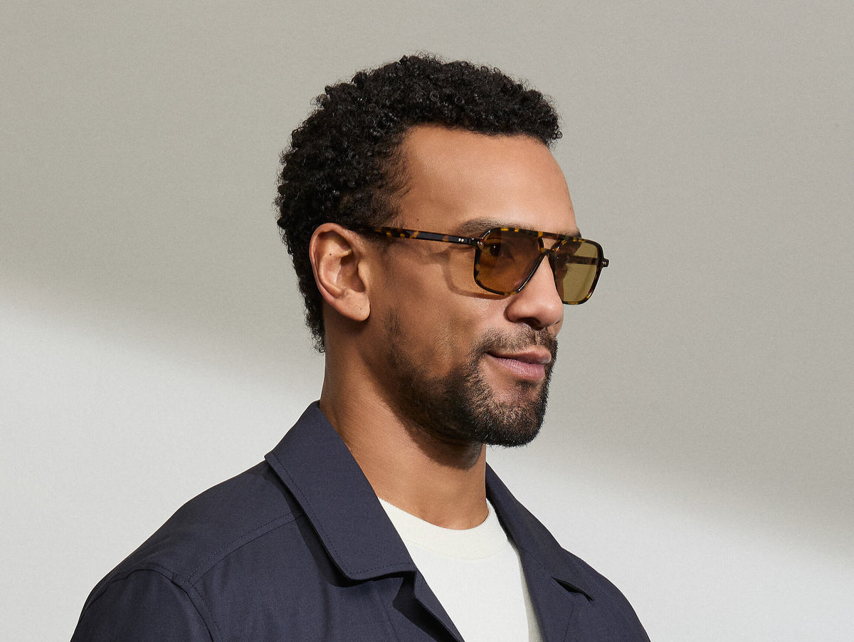 Model is wearing The MINYAN SUN in size 54 in Tortoise with Amber Tinted Lenses