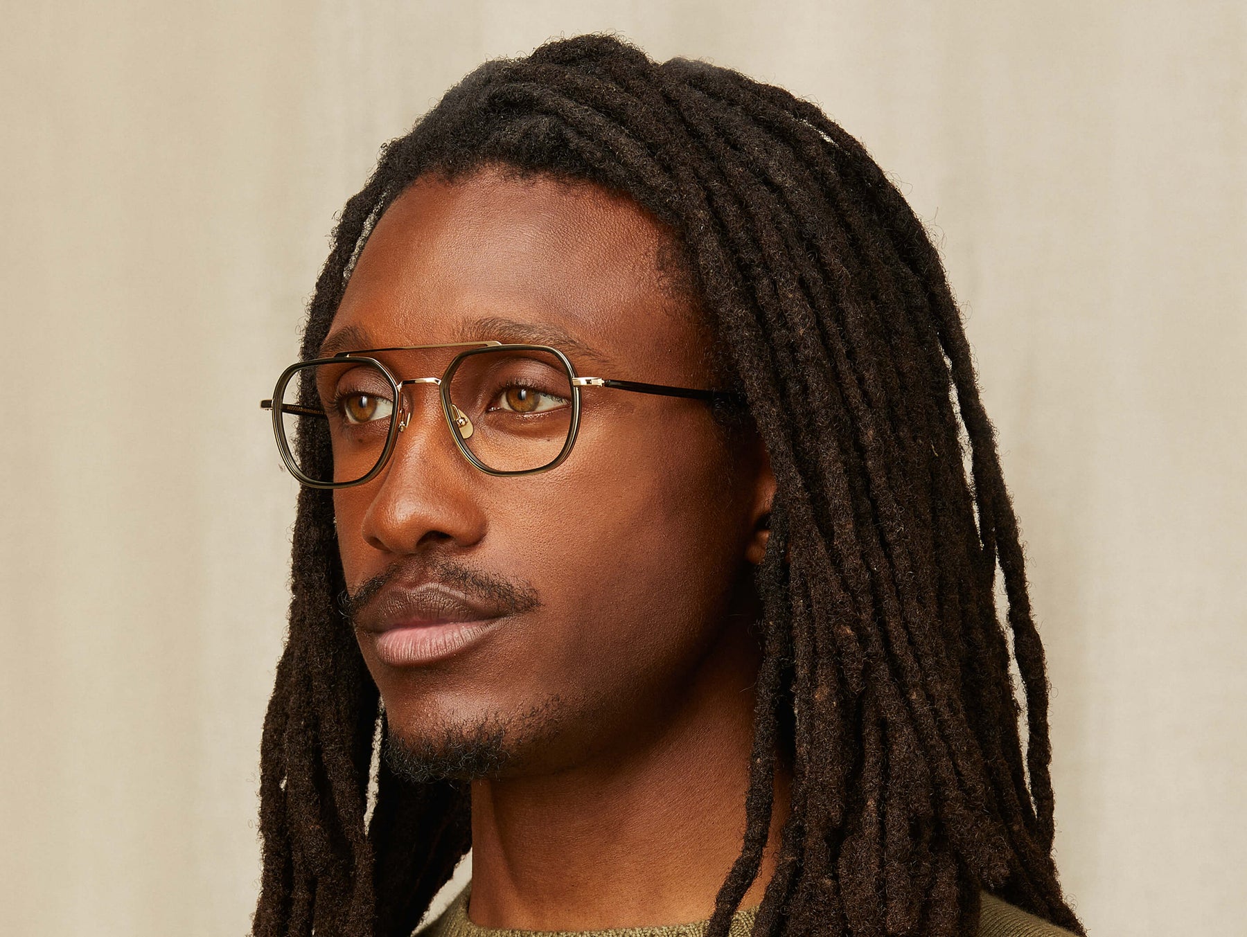 Model is wearing The MIZER in size 51 in Dark Green