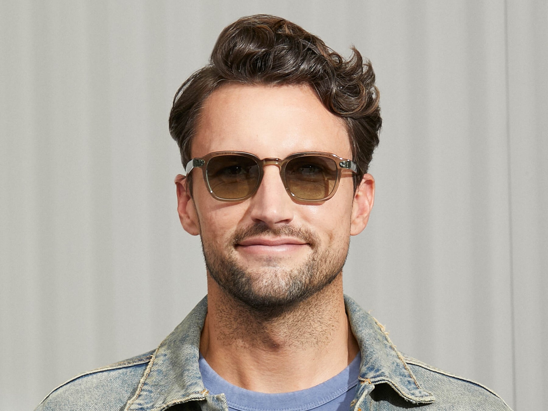 Model is wearing The MOMZA SUN in Sage in size 49 with Forest Wood Tinted Lenses