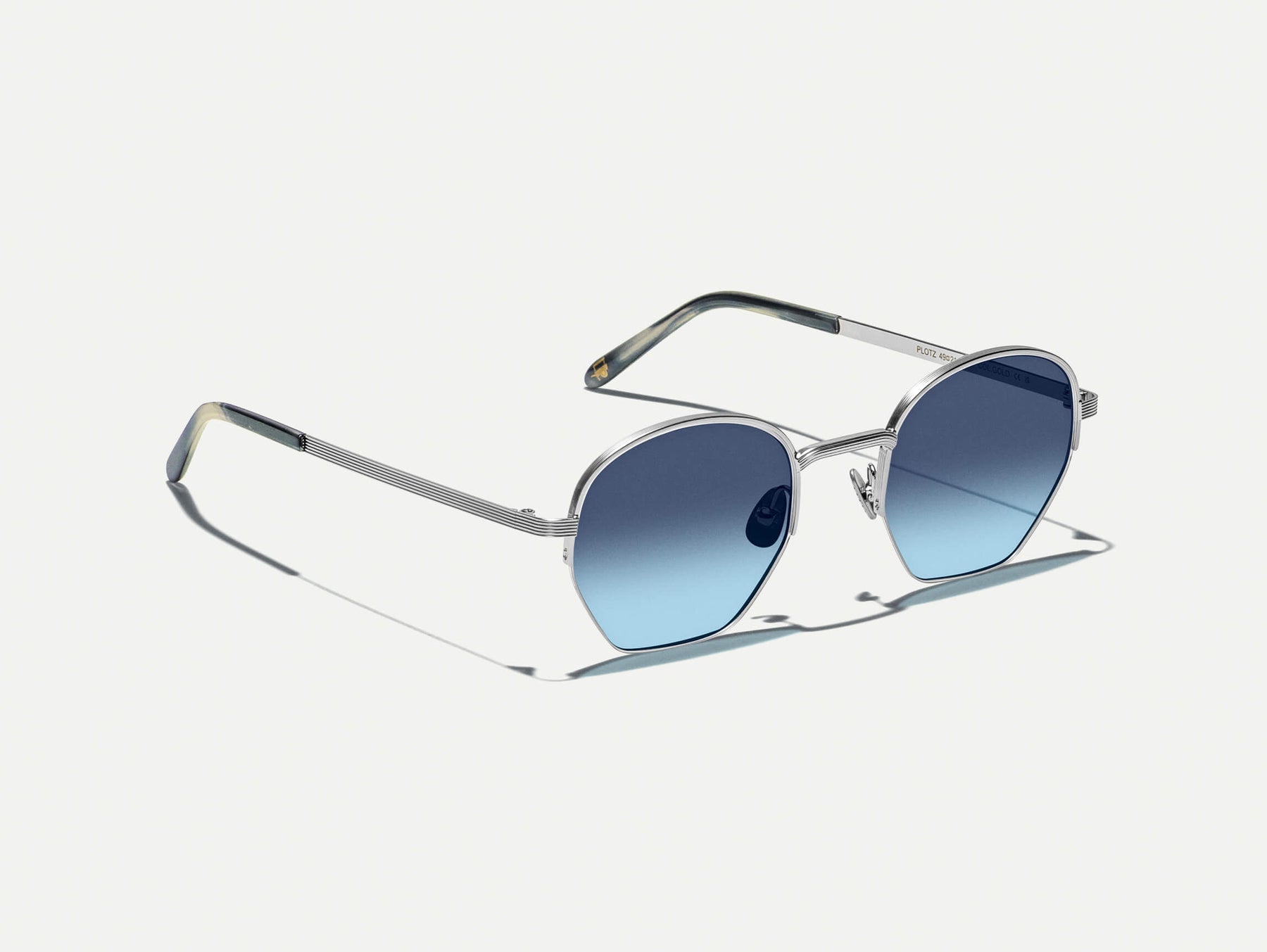 The PLOTZ SUN in Silver with Denim Blue Tinted Lenses
