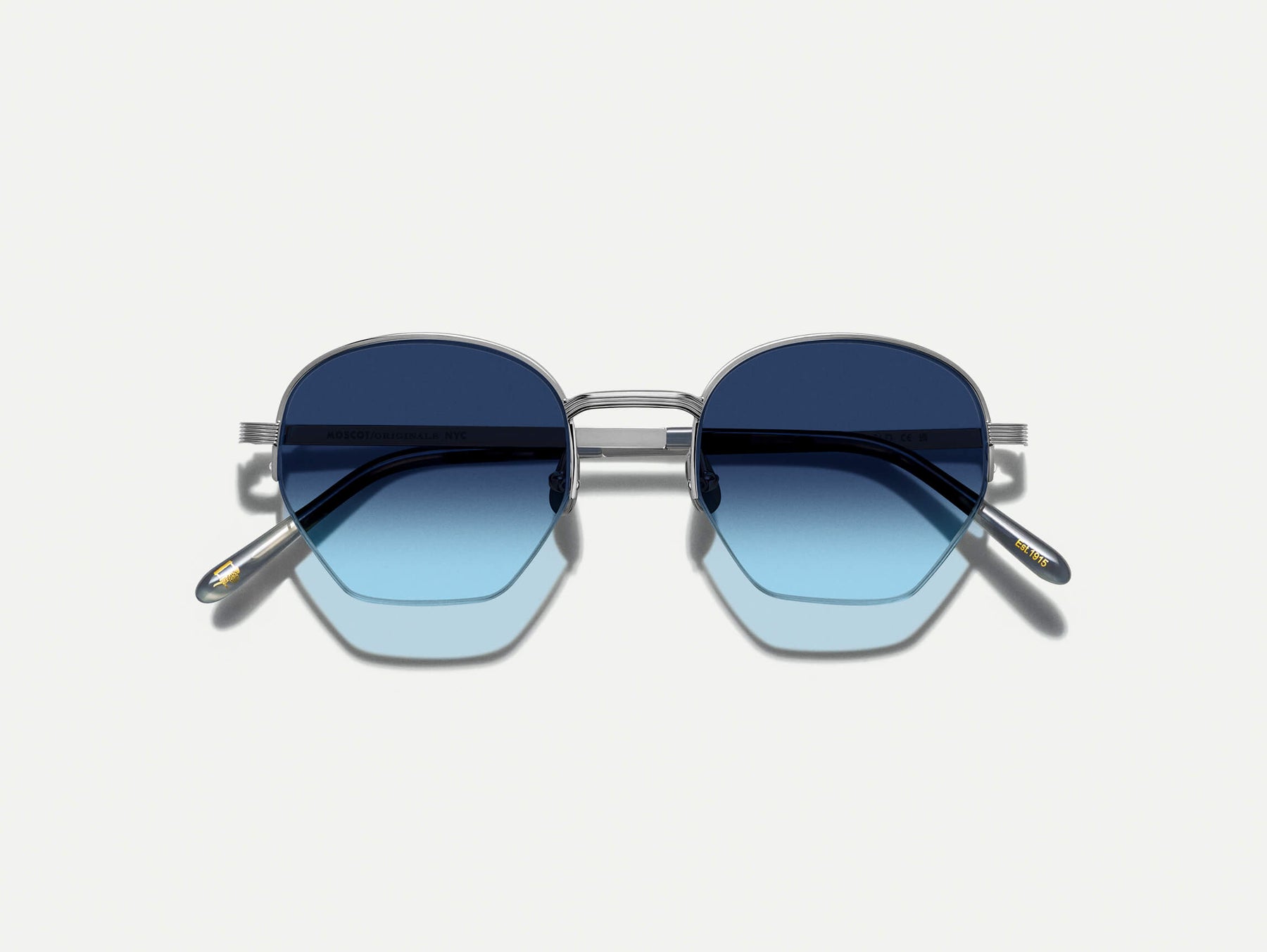 The PLOTZ SUN in Silver with Denim Blue Tinted Lenses