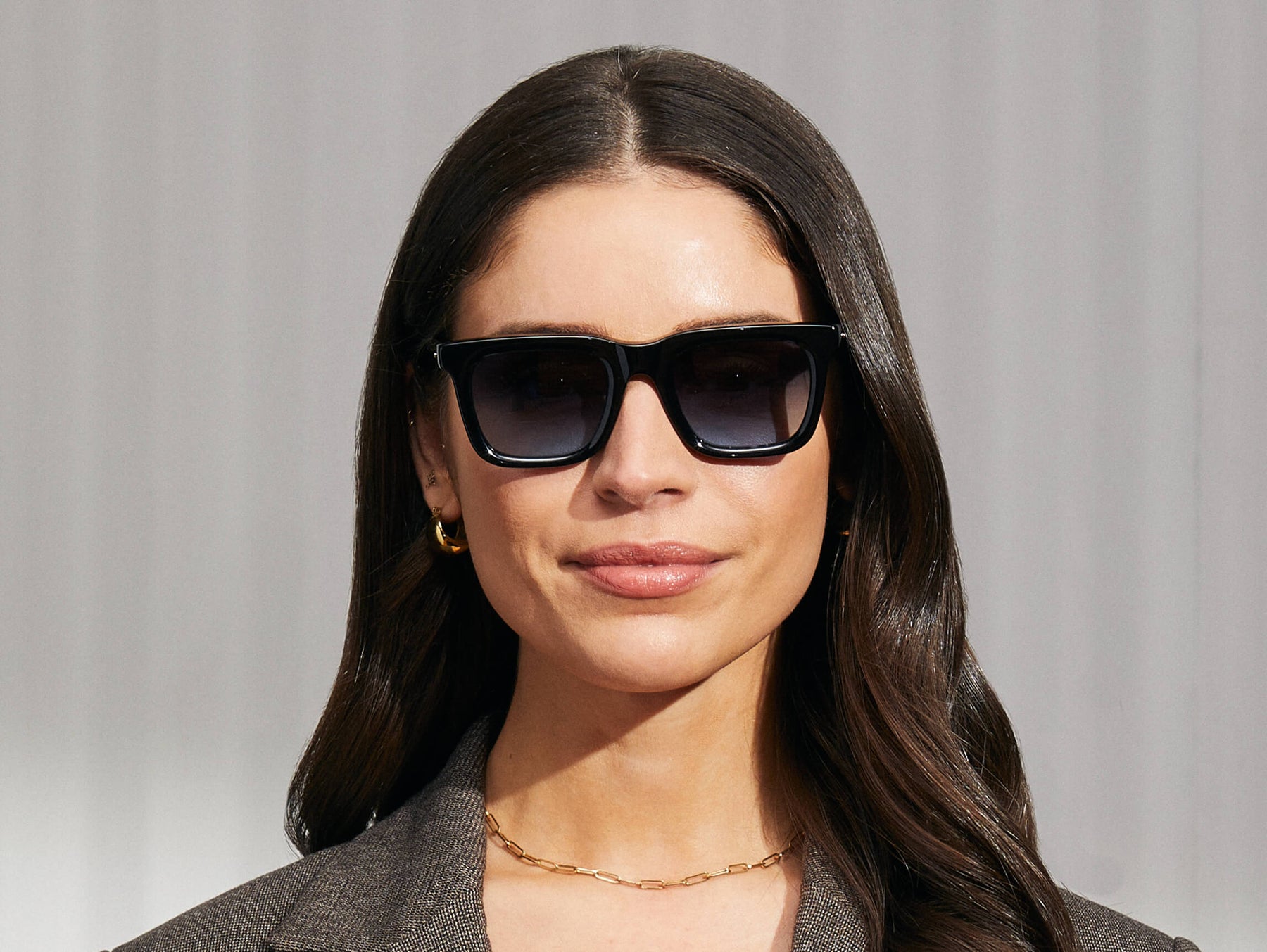 Model is wearing The RIZIK in Black in size 49 with Denim Blue Tinted Lenses