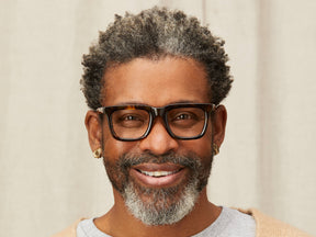 Model is wearing The RIZIK in size 49 in Classic Havana