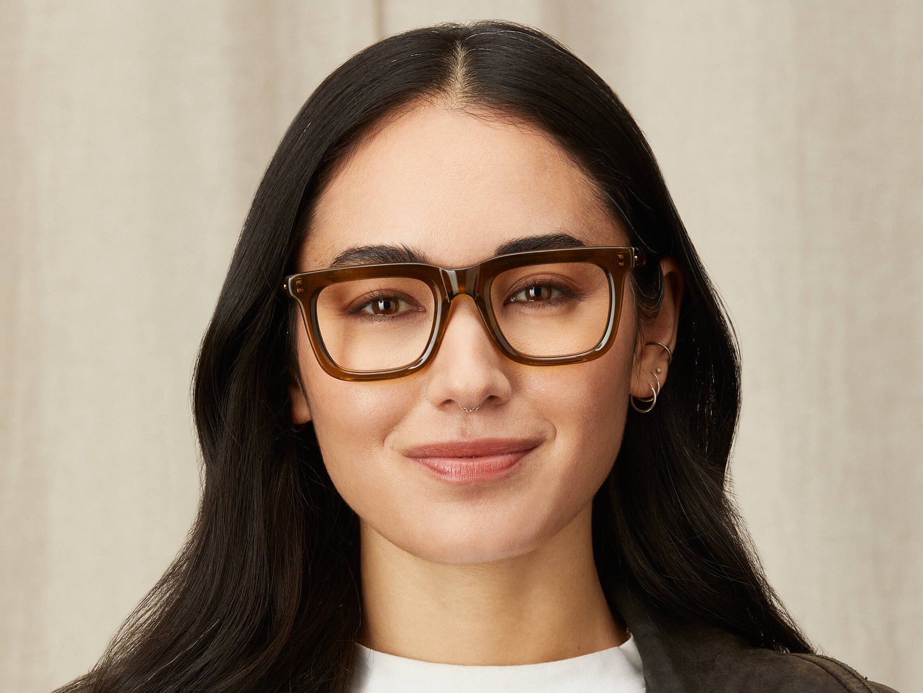 Model is wearing The RIZIK in size 49 in Olive Brown