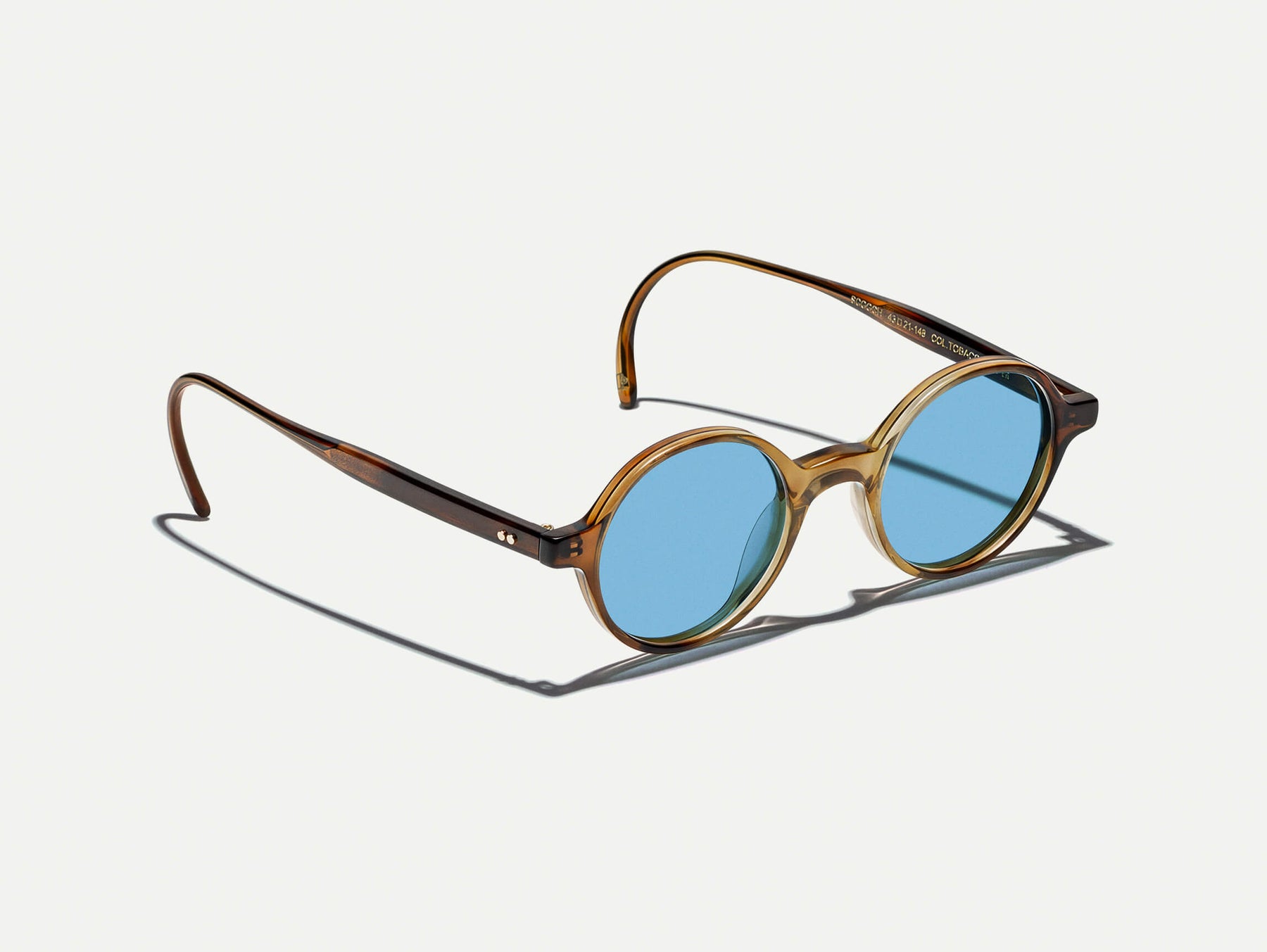 The SCOOCH SUN in Tobacco with Celebrity Blue Tinted Lenses