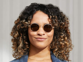 Model is wearing The SCOOCH SUN in Flesh/Tortoise in size 46 with G-15 Lenses