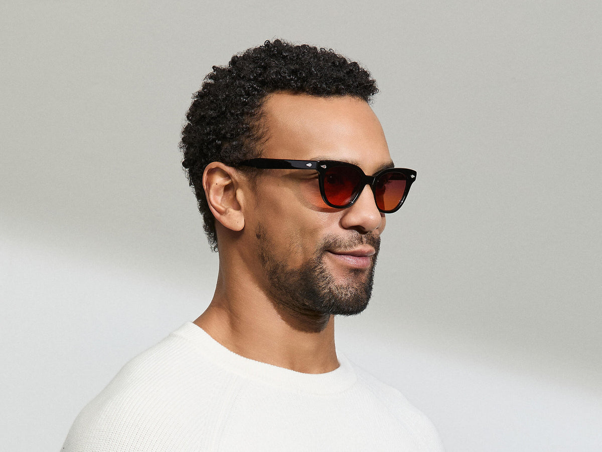 Model is wearing The SHANEKITE SUN in Black in size 49 with Cabernet Tinted Lenses
