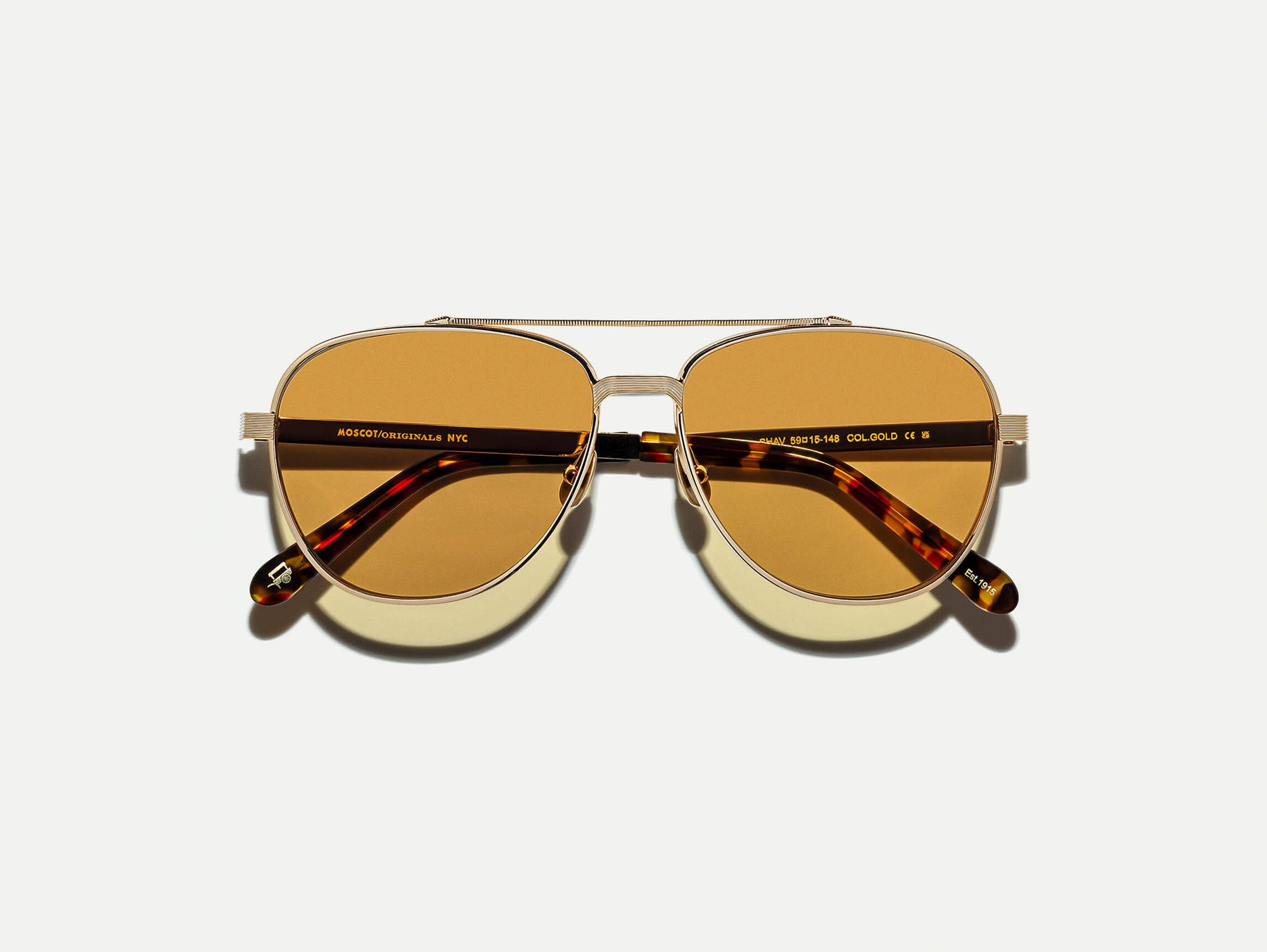 The SHAV SUN in Gold with Amber Tinted Lenses