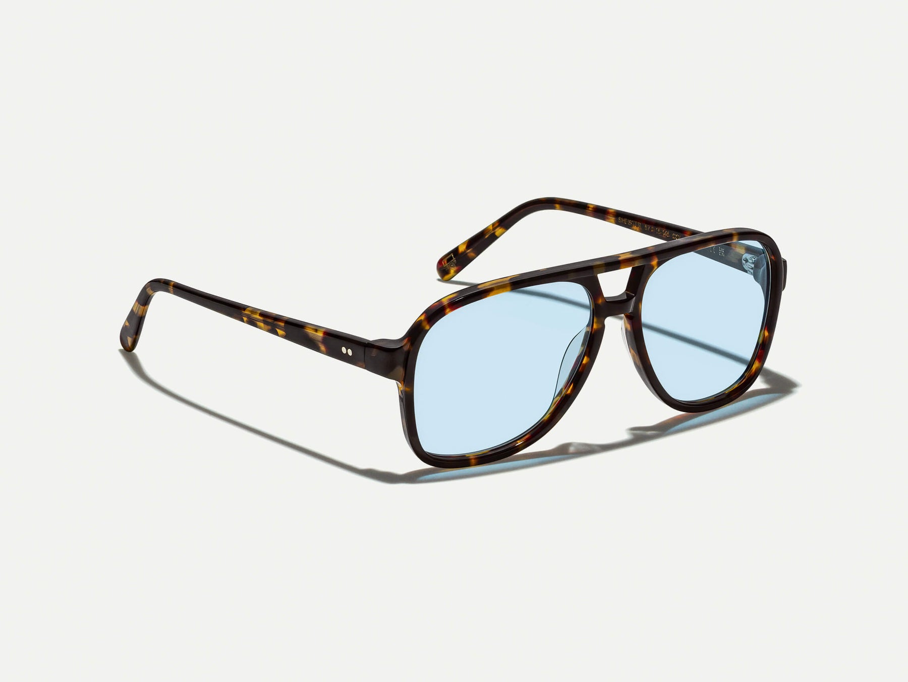 The SHEISTER SUN in Tortoise with Bel Air Blue Tinted Lenses