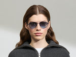 Model is wearing The SHMECKEL SUN in size 53 in Navy with Denim Blue Tinted Lenses